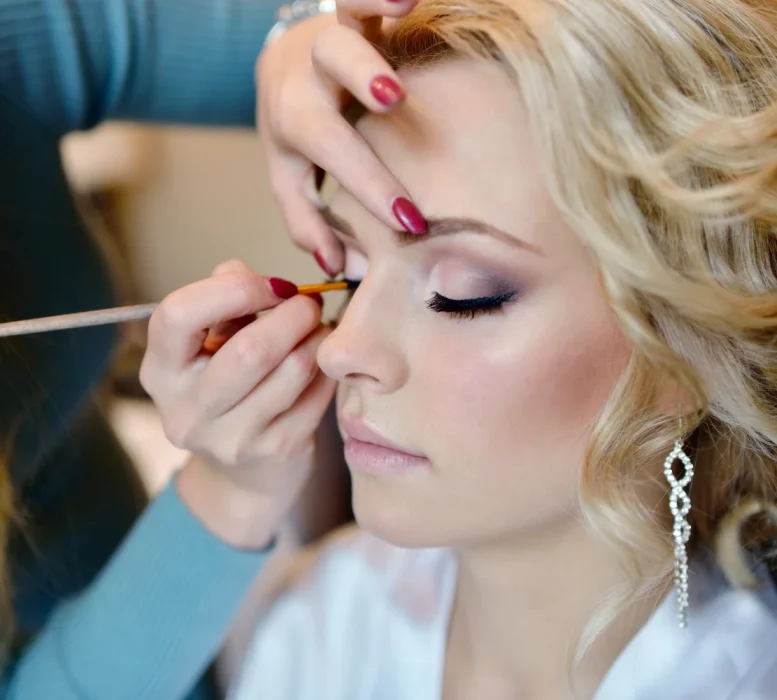 wedding-makeup-artist-making-a-make-up-for-bride-2024-09-19-14-18-31-utc